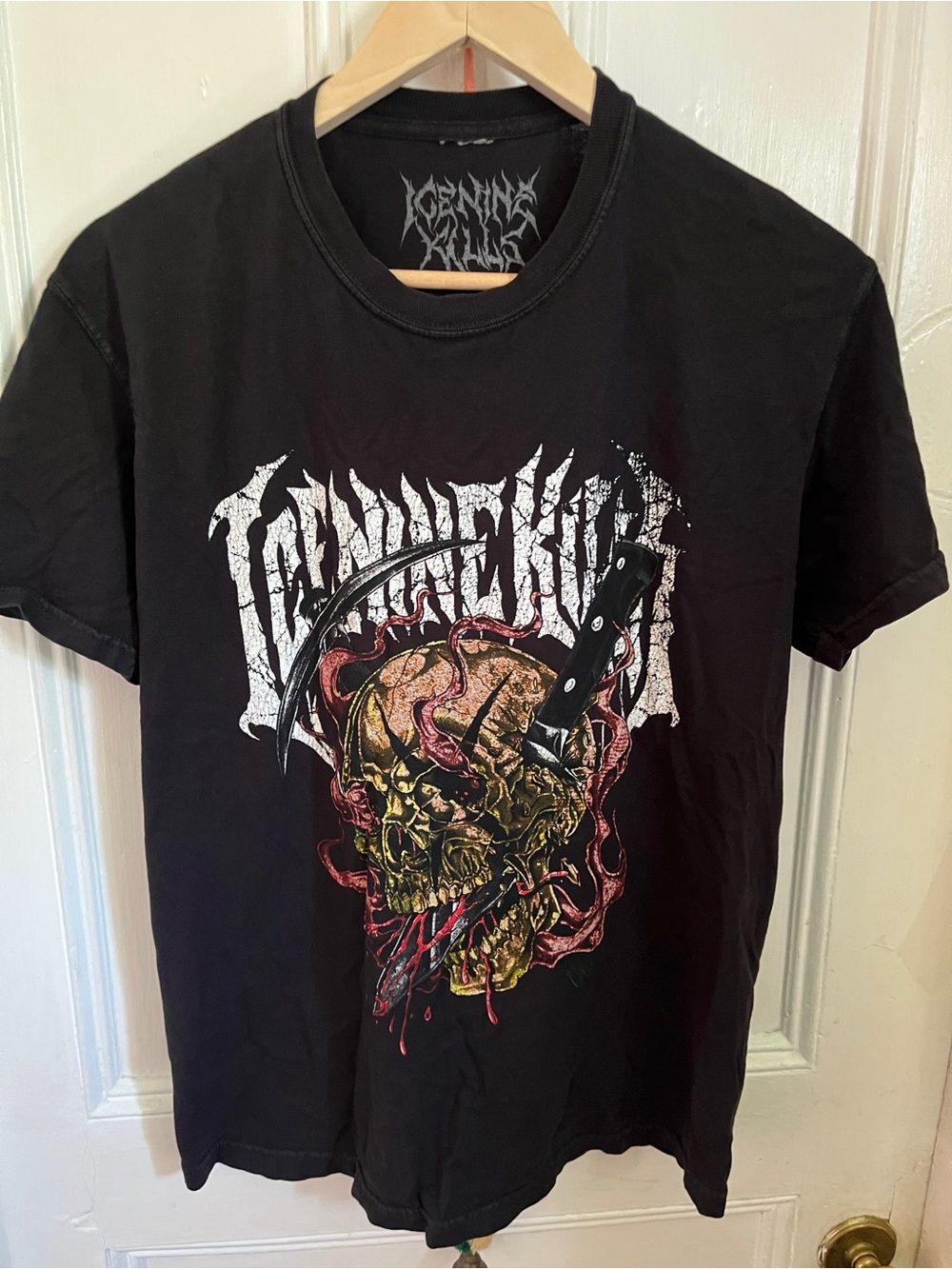 Black Graphic Skull Tee with Knife Motif